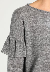 Mavi Neule - mottled grey