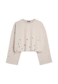 Beżowy krótki sweatshirt z długim rękawem, z szerokimi rękawami i okrągłymi wycięciami rozmieszczonymi na przodzie i rękawach.