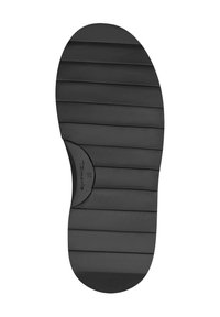 Semelle de chaussure en caoutchouc noir avec des rainures verticales, bout arrondi et logo circulaire inséré. Taille 37 marquée sur le côté. Texture lisse.