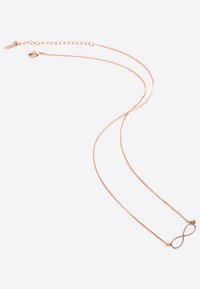 Collana in oro rosa con una delicata catena e un pendente a simbolo dell'infinito. Caratterizzata da una finitura liscia e un design minimalista.