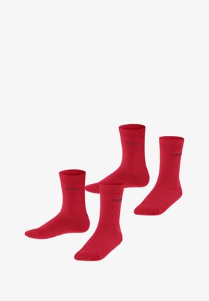 Chaussettes en coton rouge avec un design à côtes et un logo sur le côté. Quatre paires présentées avec une hauteur de chaussette standard et une texture lisse.
