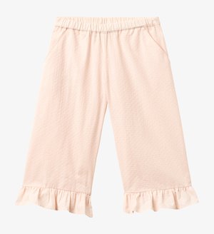 Pantaloni roz deschis cu picior larg, talie elastică, material texturat, buzunare laterale și tivuri cu volane.