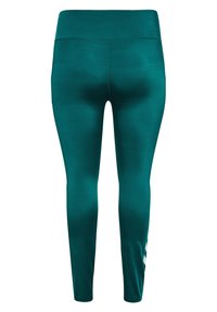 Teal leggings met een hoge tailleband, gemaakt van een glad, rekbaar materiaal. Bevat een witte logo-detail aan de linkerkant.