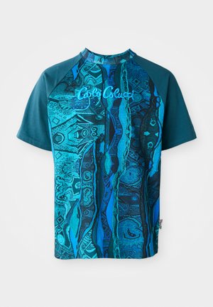 Short-sleeve T-shirt in teal and blue patterns with abstract designs, featuring a rounded neckline and logo detail on the front.