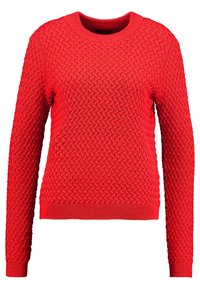 Pull en tricot rouge avec un motif texturé, col rond et manches longues. Présente des poignets et un ourlet côtelés pour un style ajusté.