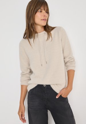 - Sweter