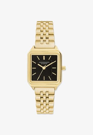 Goldfarbene Armbanduhr mit quadratischem schwarzen Ziffernblatt, goldenen Stundenmarkierungen und -zeigern, verknüpftem Metallarmband, zeigt die Uhrzeit 10:10:37.