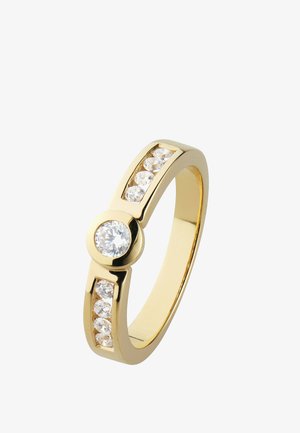 Goldener Ring mit einem großen zentralen runden Diamanten und sechs kleineren Diamanten, die in zwei Reihen entlang des Rings gefasst sind.