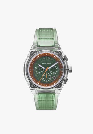 Transparente Armbanduhr mit grünem Armband, grünem Zifferblatt, orangefarbenem Außenring, drei Hilfszifferblättern, Datumsfenster sowie silbernen Zeigern und Markierungen.