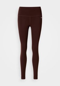Brązowe elastyczne legginsy z wysokim stanem, wykonane z rozciągliwego materiału. Prosty design bez widocznych wzorów czy akcentów.