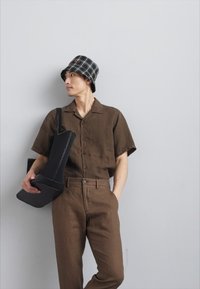 NN.07 THEO - Püksid - brown