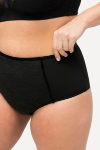 Culotte taille haute noire en dentelle et tissu lisse, avec une ceinture solide, un design sans couture et un ajustement confortable.
