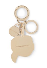 Gold keychain featuring multiple rings and a silhouette design, engraved with "KARL LAGERFELD." Smooth texture with polished finish.