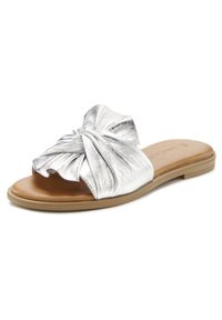 Silver metallic slide sandal with a twisted fabric detail on the strap, tan footbed, and flat rubber sole.