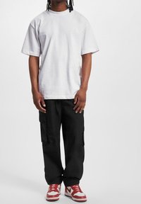 ecko unltd. Kapsáče - black