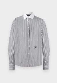 Black and white striped button-up shirt with a white collar, featuring a small black logo on the left side and striped cuffs.