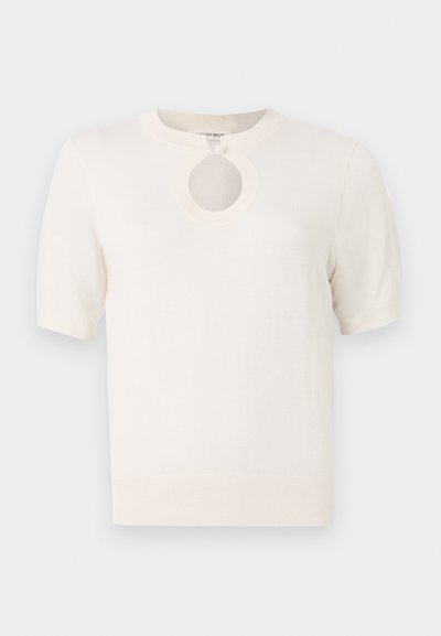 Short-sleeve cream knit top featuring a round neckline with a circular cut-out detail. Smooth texture and fitted silhouette.