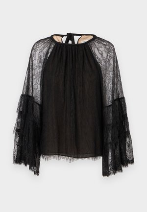 Sort blonde top med løs pasform, høj hals og lange udvidede ærmer. Teksturiseret blonde mønster med bindebånd lukning bagpå.