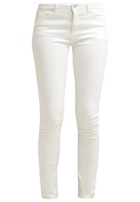 Witte, slim-fit jeans van een zachte, elastische katoenmix. Voorzien van vijf zakken en een sluiting met een knoop aan de voorkant. Gladde textuur, schoon ontwerp.