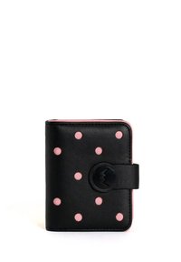 Black leather wallet featuring raised pink polka dots, a pink interior, and a round black clasp. Compact, square shape with a textured surface.