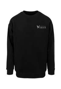 Black sweatshirt with long sleeves. Features crew neckline and ribbed cuffs. Printed logo "ETERNAL GRACE" on left chest in white. Soft texture.