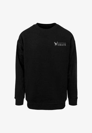 Black sweatshirt with long sleeves. Features crew neckline and ribbed cuffs. Printed logo "ETERNAL GRACE" on left chest in white. Soft texture.