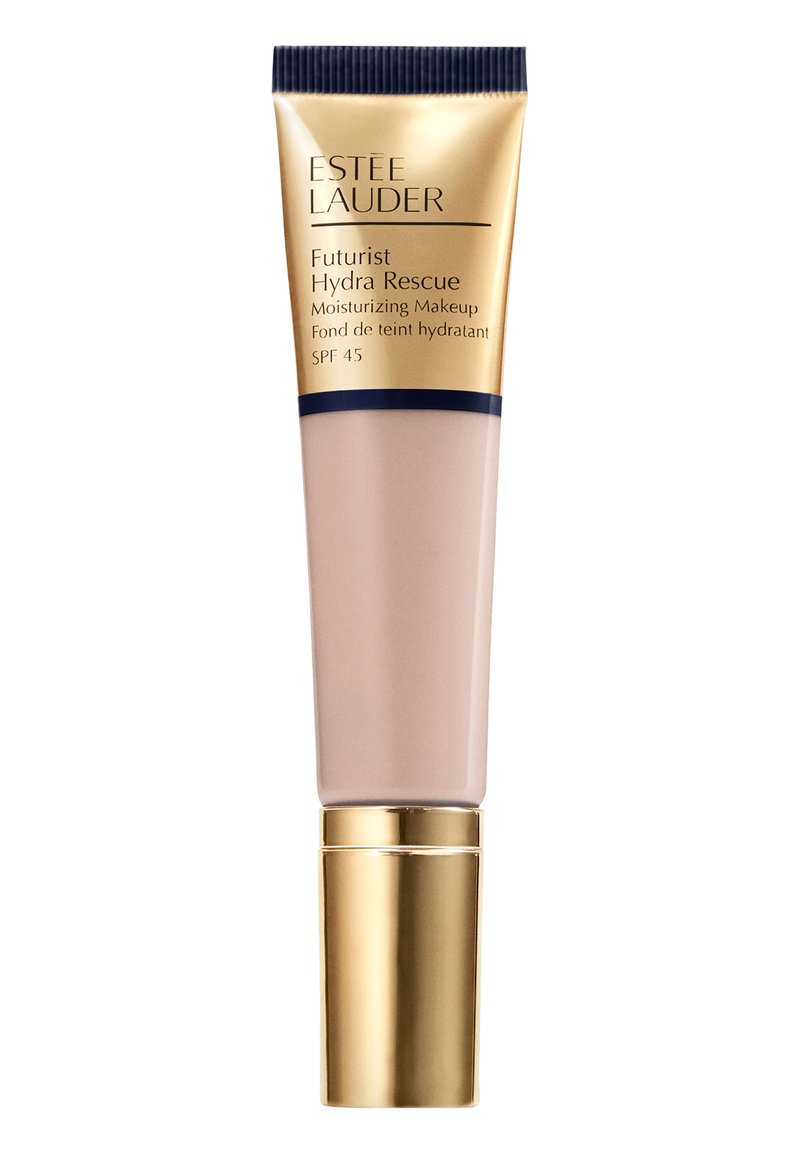Tube d'Estee Lauder Futurist Hydra Rescue, de couleur beige clair, avec des accents dorés et navy. Détails de l'étiquette : "Maquillage Hydratant," SPF 45.