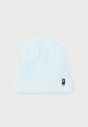 Light blue ribbed knit beanie with a soft, fluffy texture and a small black logo patch on the side.