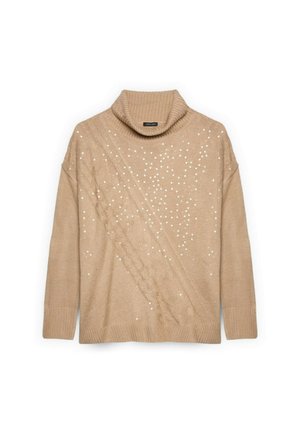 Maglione beige a collo alto con design a treccia testurizzata e dettagli bianchi sparsi. Caratterizzato da bordi a coste e una vestibilità rilassata.