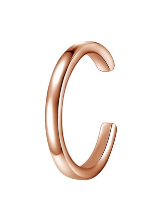 Bracelet en métal rose gold avec un design lisse et arrondi aux extrémités ouvertes, présentant une finition polie et une forme sans soudure.