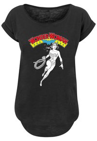 Svart T-skjorte med Wonder Woman-illustrasjon i hvitt og rødt, med blå detaljer. Rund halslinning og korte rullede ermer. Myk tekstur.