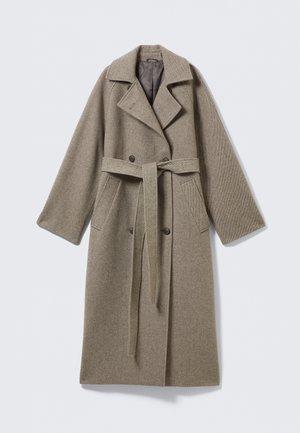 Pikk villane mantel summutatud beežis toonis, sälguga krae, kahe ridadega nööpkinnis, vöökohaga vöö ja küljetaskutega. Tekstureeritud kangas.