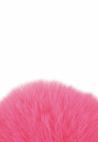 Bright pink fluffy fur texture with fine strands against a plain white background.