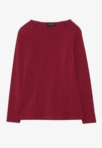Long-sleeve top in deep red, made of soft fabric. Features a rounded neckline, raglan sleeves, and side slits at the hem for ease of movement.