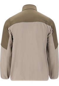 Fleecejakke i beige med olivengrønne skuldre. Har høj krave og elastiske manchetter. Blød tekstur med minimal brandingdetalje.