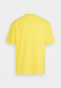 Plain bright yellow short-sleeve crew neck T-shirt shown from the back on a white background.