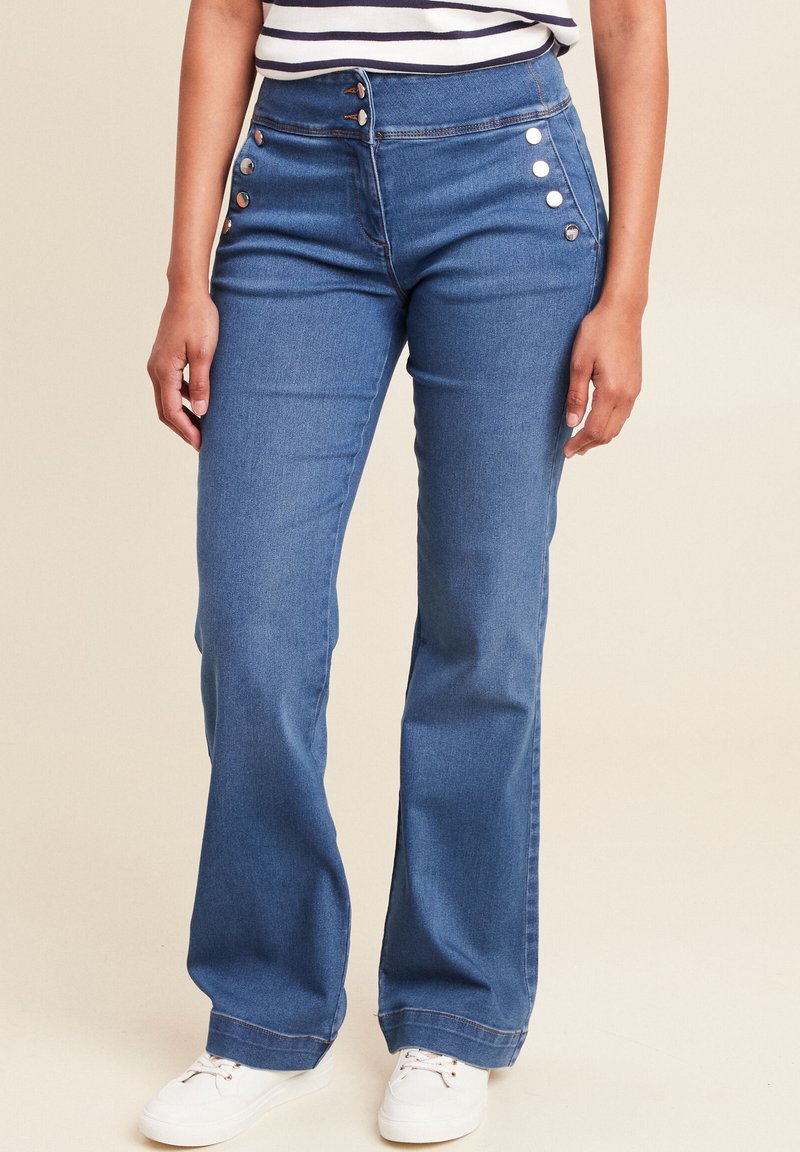 Blauwe denim flared jeans kenmerken zich door een hoge taille en zijknopen. De stof heeft een gladde textuur met subtiele stiksels aan de zoom.
