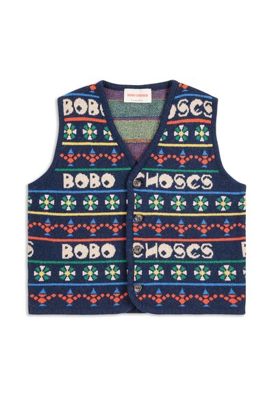 Ullväst med en marinblå bas som har flerfärgade mönster, inklusive text och geometriska designer; fyraknappsförslutning, v-ringad hals.