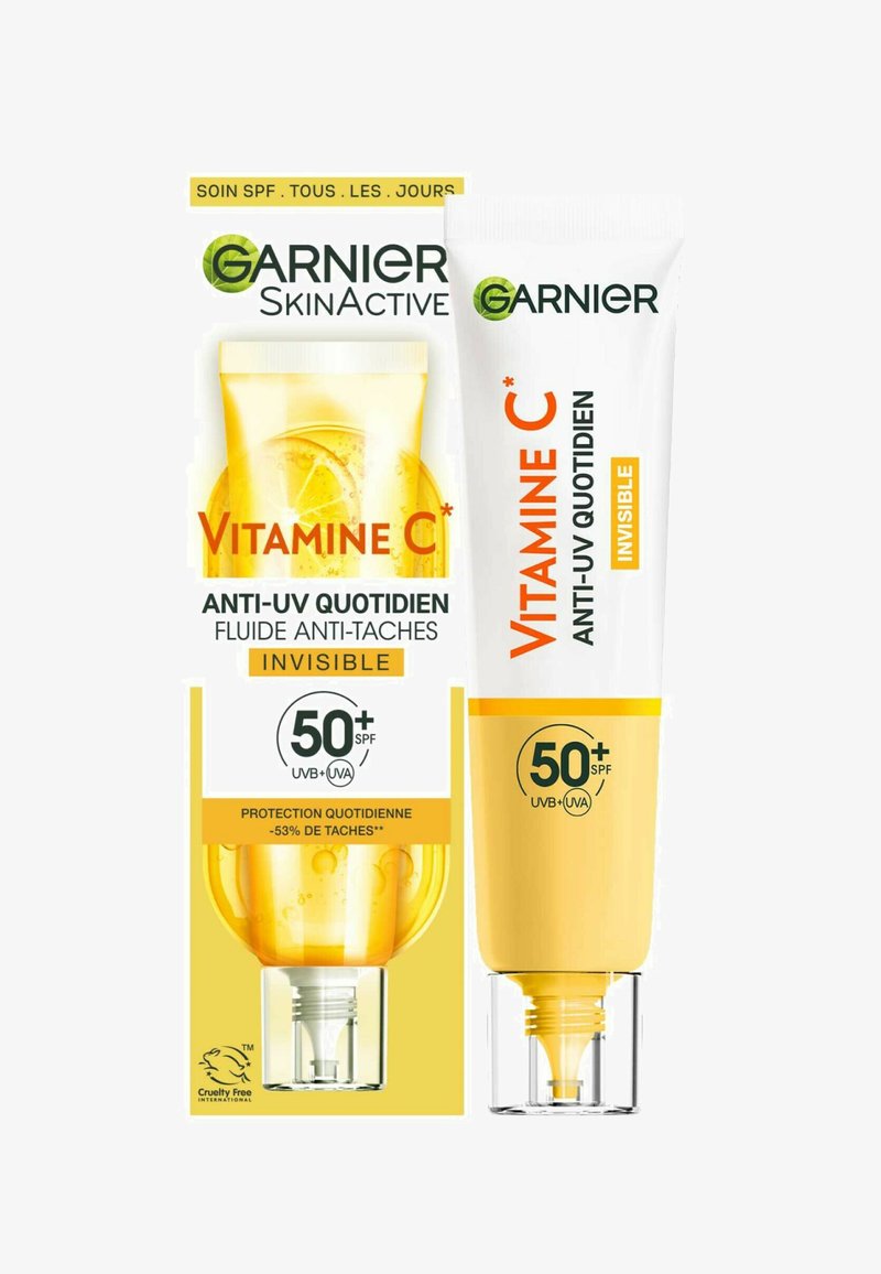 Crème solaire Garnier Vitamine C SPF 50+, dans un tube blanc et jaune, avec un capuchon transparent et un design mettant en avant la protection UV et les propriétés anti-imperfections.