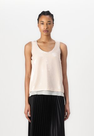 Sequin tank top in light pink, featuring a scoop neckline and wide straps, layered over a sheerer gray bottom. Pleated black skirt below.