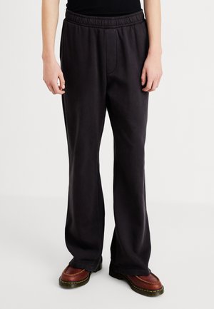 FLARED - Trainingsbroek - black