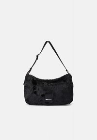 Black faux fur handbag with a soft texture, rectangular shape, adjustable strap, and a small black logo patch on the side.