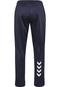 Marineblauwe sportbroeken van gladde stof, met een elastische tailleband en witte chevronpatronen langs de zijkanten.