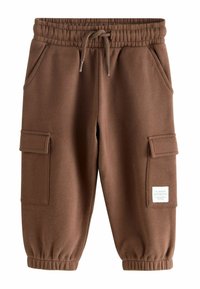 Brown fleece joggers with an elastic waistband, adjustable drawstring, side pockets, and two cargo-style pockets. Features a small label.