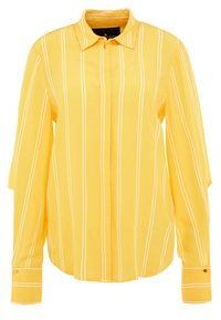 Camicia gialla a maniche lunghe con strisce verticali bianche, colletto, chiusura a bottoni e bottoni ai polsini. Tessuto liscio con una vestibilità leggermente ampia.