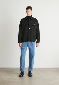 BOSS SHYNE - Nohavice chinos - open blue