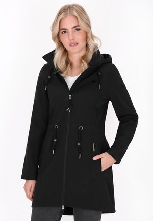 Black waterproof jacket with a hood, drawstring waist, zip closure, and side pockets. Features a smooth texture and minimalist design.