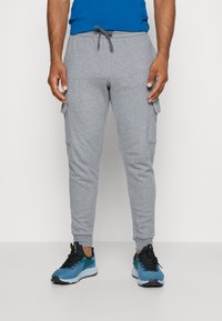 Under Armour - RIVAL JOGGER - Tracksuit bottoms - castlerock light heather/white Thumbnail Image 1