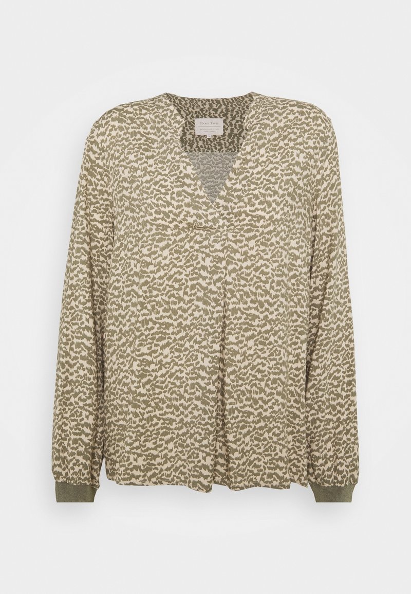 Haut à manches longues vert olive avec un col en V et un tissu texturé, présentant un motif abstrait beige. Poignets élastiqués avec une coupe décontractée.