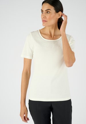 White short-sleeve t-shirt with a decorative round neckline featuring subtle embellishments. Lightweight fabric with a smooth texture.